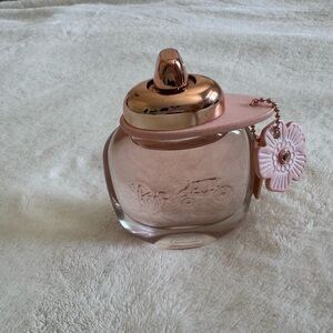 Coach Perfume Bottle with Pink and Gold Accents
